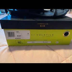 Black fringe sandals